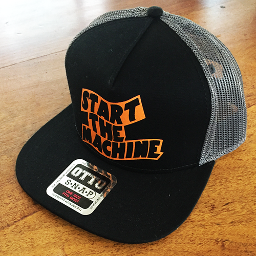 START THE MACHINE Logo Trucker Hat